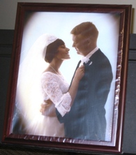 Bill and Rozanne Ruhsam's Wedding photo, after some judicious retouching by a specialist, who's name will be placed here as soon as I find out who did it. Spectacular, I say, and you cannot appreciate how wonderful this looks without seeing it. Use this guy! He's good.